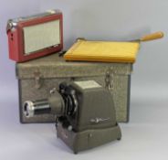 ALDIS CINE PROJECTOR IN CASE, vintage Bush TR130 transistor radio and a small desk top guillotine