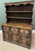 REPRODUCTION OAK DRESSER, a fine example with a shaped and carved rack on a base section of three