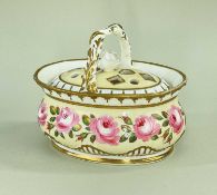 AN INTERESTING ENGLISH PORCELAIN FLOWER BASKET & COVER of oval shape with pierced cover bearing rose