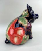 COUNTRY ARTISTS 'INSPIRATION' CHINA SEATED PIG, tube-line decorated with autumn fruit, 26cm high