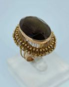14K GOLD SMOKY QUARTZ DRESS RING, ring size Q, 10.6gms Provenance: deceased estate
