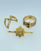 9CT GOLD JEWELLERY comprising 9ct gold wishbone ring, 9ct gold buckle ring and a 9ct gold bar brooch
