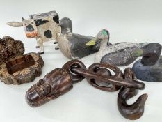 GROUP OF WOODEN FURNISHING CURIOS including three duck decoys, a standing friesian cow, a carved