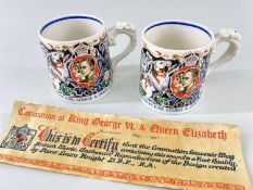 PAIR LAURA KNIGHT 1937 GEORGE VI & ELIZABETH CORONATION MUGS, and a printed certificate (3)