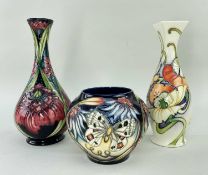 MOORCROFT POTTERY comprising three tube-lined vases including 'Apollo Butterfly' vase, dated