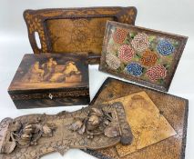 FOUR POKERWORK / PYROGRAPHYED ITEMS, comprising good floral twin-handled tray, 47 x 26cms, good