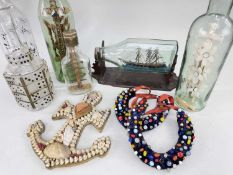 A GROUP OF MARITIME SOUVENIRS comprising four models 'in bottles' including one galleon and
