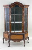 20TH CENTURY MINIATURE DUTCH CABINET, with glazed door and angles above a pull-down cupboard, on
