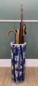 CLYNDRICAL JAPANESE ARITA PORCELAIN UMBRELLA STAND & CONTENTS including walking-sticks, fruit-picker