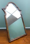QUEEN ANNE-STYLE WALNUT DRESSING TABLE MIRROR, with hollow moulded arched frame, easel-back strut