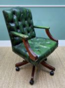 REPRODUCTION SWIVEL ARMCHAIR green leather button upholsteryComments: leather distressed and soiled