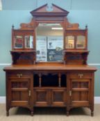 EARLY 20TH CENTURY WALNUT MIRROR-BACK CABINET, in the Arts & Crafts style by Trapnell & Gane, with