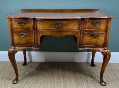 QUEEN ANNE-STYLE WALNUT CROSSBANDED WRITING TABLE, by Richardson of Highgate, of arc en arbalète