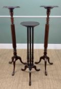 THREE REPRODUCTION GEORGIAN TORCHERES, including a pair with reeded columns, the smaller with triple