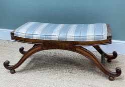 19TH CENTURY MAHOGANY WINDOW STOOL, channel moulded scroll supports joined by ring-turned