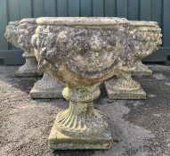 SET OF SIX COMPOSITION STONE GARDEN URN, fruit moulded decoration, 48cm h. (6)Provenance: contents