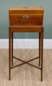 GEORGE III MAHOGANY TEA CADDY, on later stand with tapering square legs joined by X-stretcher, 15