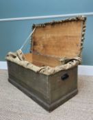 PAINTED PINE TRUNK with wrought iron carry handles, later upholstered top and sides, as an
