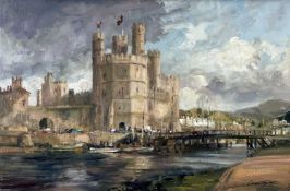 ‡ IVAN TAYLOR oil on board - entitled verso 'Caernarfon Castle and Harbour', signedDimensions: 39