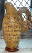 AN IMPORTANT ARTS & CRAFTS SLIPWARE POTTERY JUG BY HORACE ELLIOTT, yellow glaze and brown slip, of