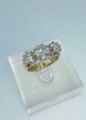 9CT GOLD THREE STONE DIAMOND RING, the three round brilliant cut stones measuring 2.0cts overall