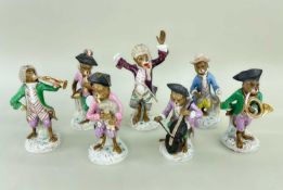 SEVEN 19TH CENTURY MEISSEN-STYLE PORCELAIN MONKEY MUSICIANS, comprising The Conductor, French