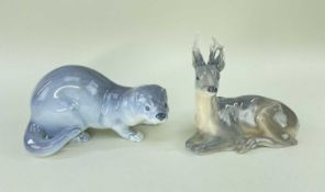 TWO ROYAL COPENHAGEN MODELS OF ANIMALS, comprising a mink, model number '4654', designed by Jeanna