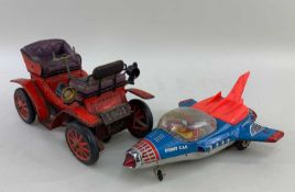 NOMURA JAPANESE TINPLATE MOTOR CAR, battery motored, with red coachwork and licence plate '1901',