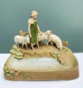 ROYAL DUX PORCELAIN FIGURE OF A SHEPHERDESS WITH SHEEP, maker's mark to base, 30h x 36cms
