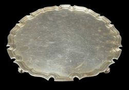 MODERN SILVER SALVER, Garrard & Co, London 1958, on four scrolled feet, 30cm diam, appr wt. 26ozt