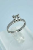 PLATINUM DIAMOND SOLITAIRE ENGAGEMENT RING, Princess cut, the single stone measuring 0.8-0.9cts