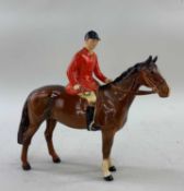 BESWICK CHINA HUNTSMAN ON BROWN HORSE, printed mark to underside, 21cms high Provenance: private