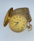 14K GOLD SLIMLINE FULL HUNTER KEYLESS-WIND POCKET WATCH, sunburst case with blank oval cartouche,