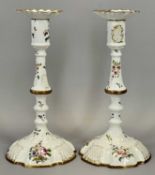 PAIR OF LATE 18TH CENTURY STAFFORDSHIRE ENAMEL CANDLESTICKS, painted in polychrome enamels with
