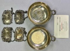 SILVER WINE/DRINKS COLLECTABLES - to include a pair of circular wine tasters with serpent handles,