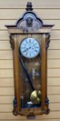 VIENNA WALL CLOCK - 8 day movement with Roman numeral digits on a white painted enamel dial with