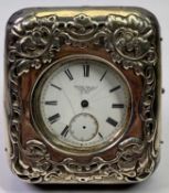 EDWARDIAN SILVER TRAVELLING WATCH CASE, with embossed decoration, Birmingham 1901, maker James