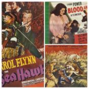 THREE REPRODUCTION COLOUR FILM POSTERS in lightwood frames, 