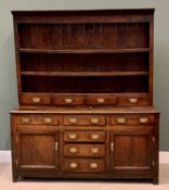 GEORGE III OAK WELSH DRESSER - three shelf back boarded rack above four spice drawers, the base