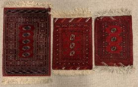 RUGS - three prayer type mats, all red ground, one labelled 