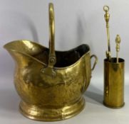 BRASS HELMET SHAPED COAL SCUTTLE, a pair of oak barley twist candlesticks with metal drip trays,
