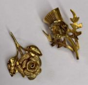 9CT GOLD FLORAL & TWIN LEAF PENDANT, 3.4grms and a 9ct gold thistle and amber stone brooch, 3.3grms