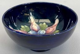 WALTER MOORCROFT SMALL BLUE GROUND PEDESTAL 'COLUMBINE' BOWL - 11cms diameter