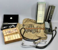 VINTAGE SURGICAL INSTRUMENTS - a Gowlland opthalmoscope in fitted case, a roll of surgical scissors,