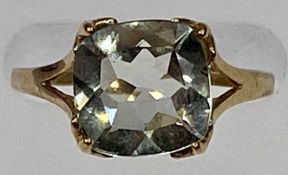 9CT GOLD DRESS RING - with unusual claw set mount, two of the sides set with a single tiny sapphire,