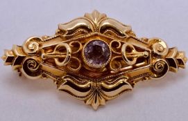 VICTORIAN 9CT GOLD AMETHYST SET BROOCH - 36 x 20mm, 3.2grms