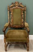 CEREMONIAL ARMCHAIR - heavily carved with mythical creatures, mask end arms and twist detail, 125cms