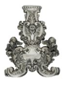 Fragment eines Kerzenleuchters. Silber, auf Holz montiert.
