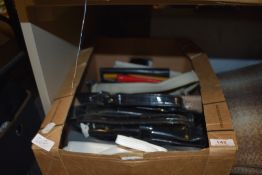 A box full of modern and retro handbags.