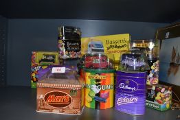 A selection of die cast model cars with advertising themes